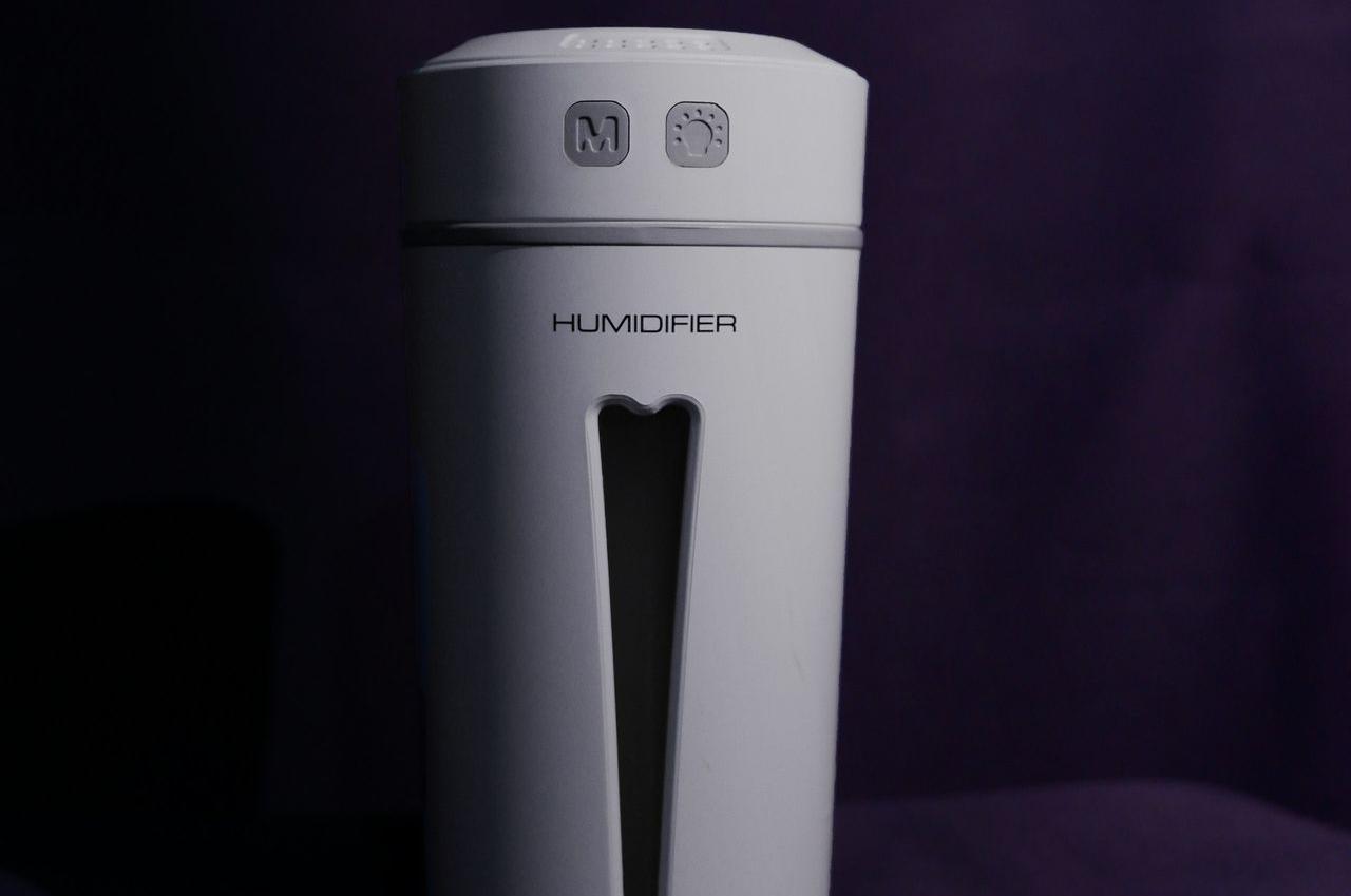 white and gray plastic bottle